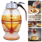 Cheqo® Honingdispenser in actie voor serveren van honing en siroop, keukenaccessoire van duurzaam kunststof met stijlvol ontwerp.
