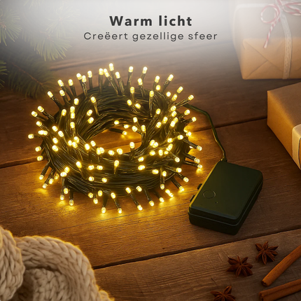 Cheqo® Kerstverlichting Op Batterij - Warm Wit LED Lampjes - Geschikt Voor Binnen En Buiten - 96 LED Lampjes - 7 Meter Lichtsnoer - Met Timer - 8-Functies Controller - IP44 Waterdicht - Zwarte Kabel - 3x AA Batterijen - Kerstlampjes - Kerstboomverlichting