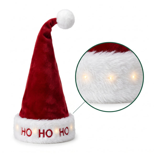 infographic-1-wit: Kinder kerstmuts met lichtjes en veer